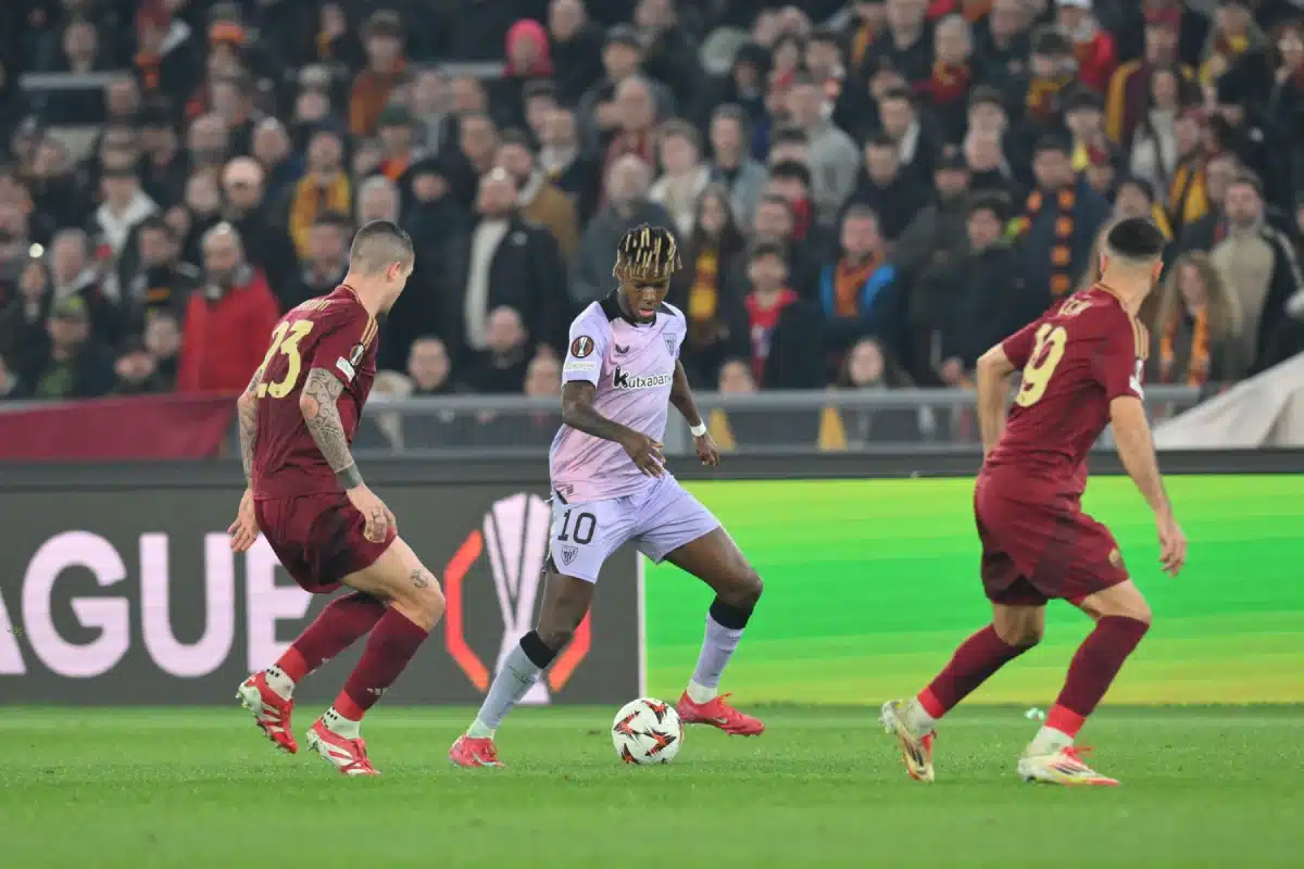 UEFA Europa League Last 16 Football; Roma versus Athletic Club Bilbao: Nico Williams of Athletic Bilbao under pressure from Gianluca Mancini of AS Roma